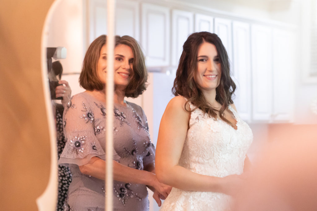 bride and mother getting ready